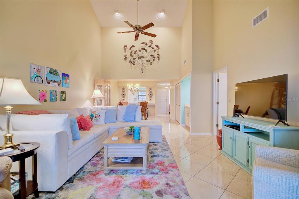 2025 Sylvester Road, Unit H2 Lakeland, FL 33803 - Photo 18 of 59 a living room with furniture and a flat screen tv