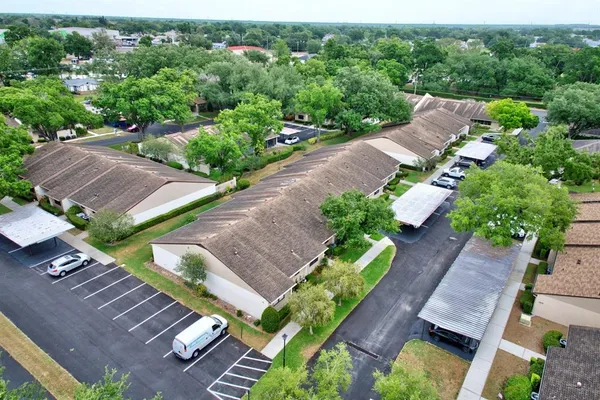 an aerial view of a house with a garden
