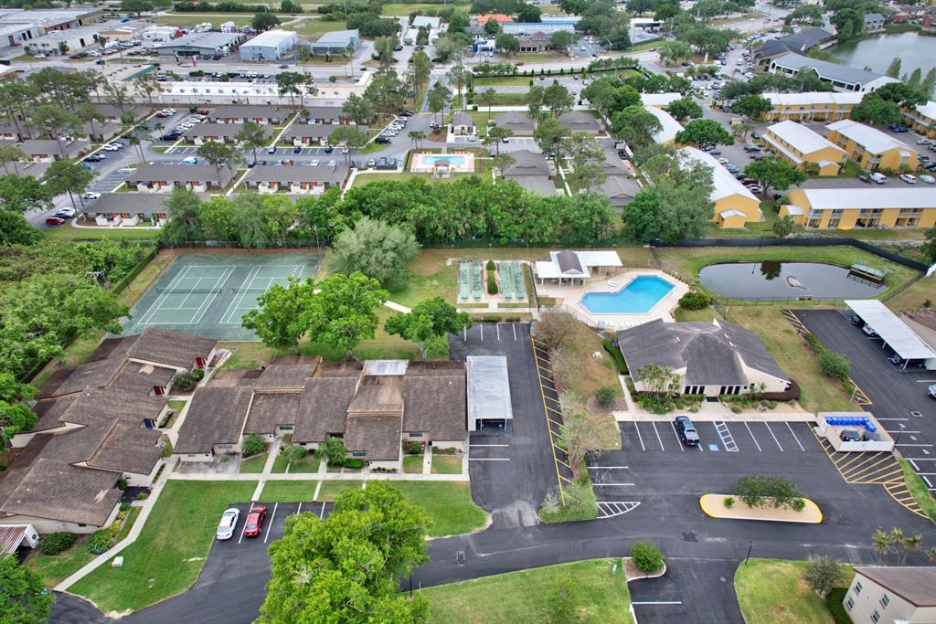 2025 Sylvester Road, Unit H2 Lakeland, FL 33803 - Photo 56 of 59 an aerial view of house with yard swimming pool and outdoor seating