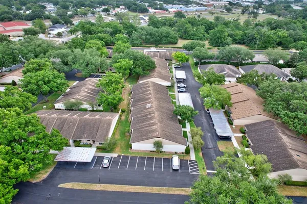 an aerial view of a house with a garden