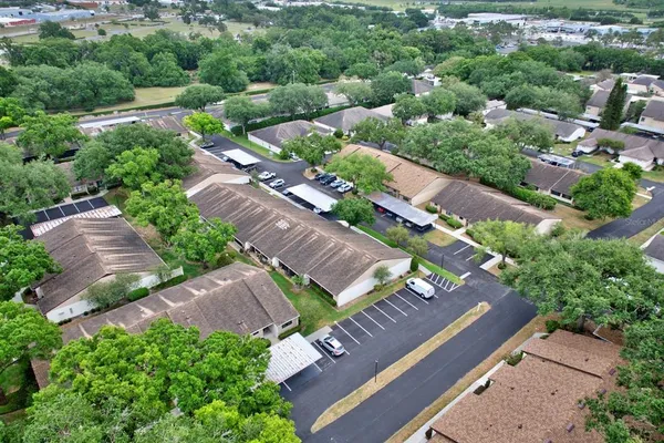 an aerial view of a house with a garden