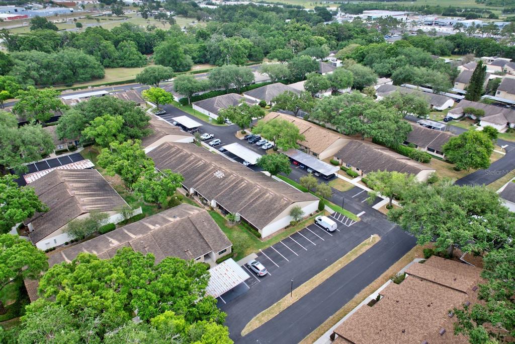 2025 Sylvester Road, Unit H2 Lakeland, FL 33803 - Photo 8 of 59 an aerial view of a house with a garden