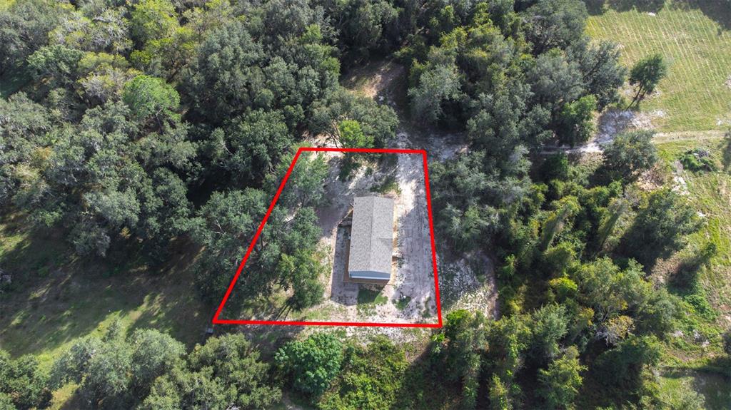 892 Southwest 124th Lane Webster, FL 33597 - Photo 25 of 29 an aerial view of a house