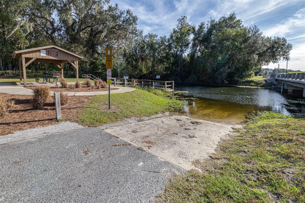 892 Southwest 124th Lane Webster, FL 33597 - Photo 27 of 29 a view of swimming pool with lawn chairs and plants