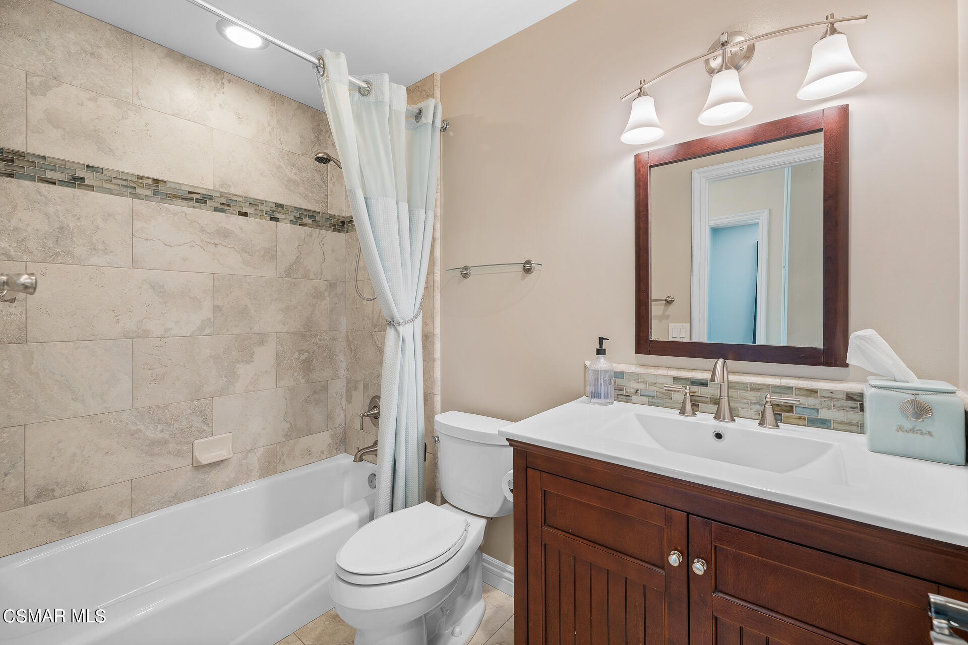3092 Big Sky Drive Thousand Oaks, CA 91360 - Photo 11 of 66 a bathroom with a sink a toilet and a mirror
