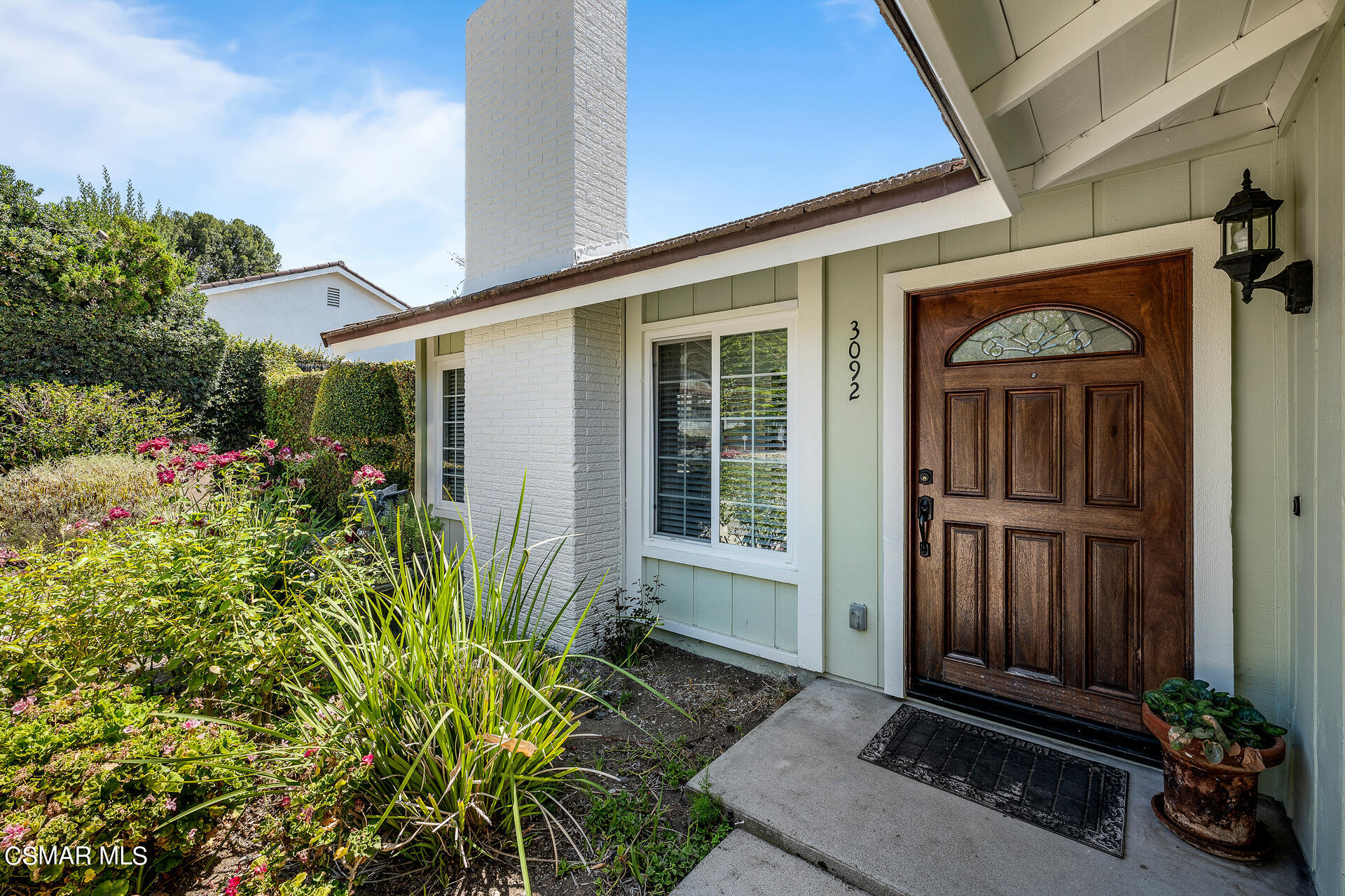 3092 Big Sky Drive Thousand Oaks, CA 91360 - Photo 16 of 66 a front view of a house with a porch