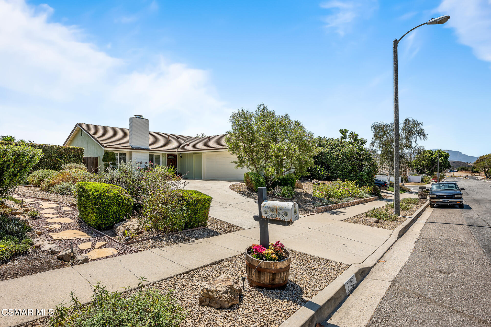 3092 Big Sky Drive Thousand Oaks, CA 91360 - Photo 17 of 66 a front view of a house with garden