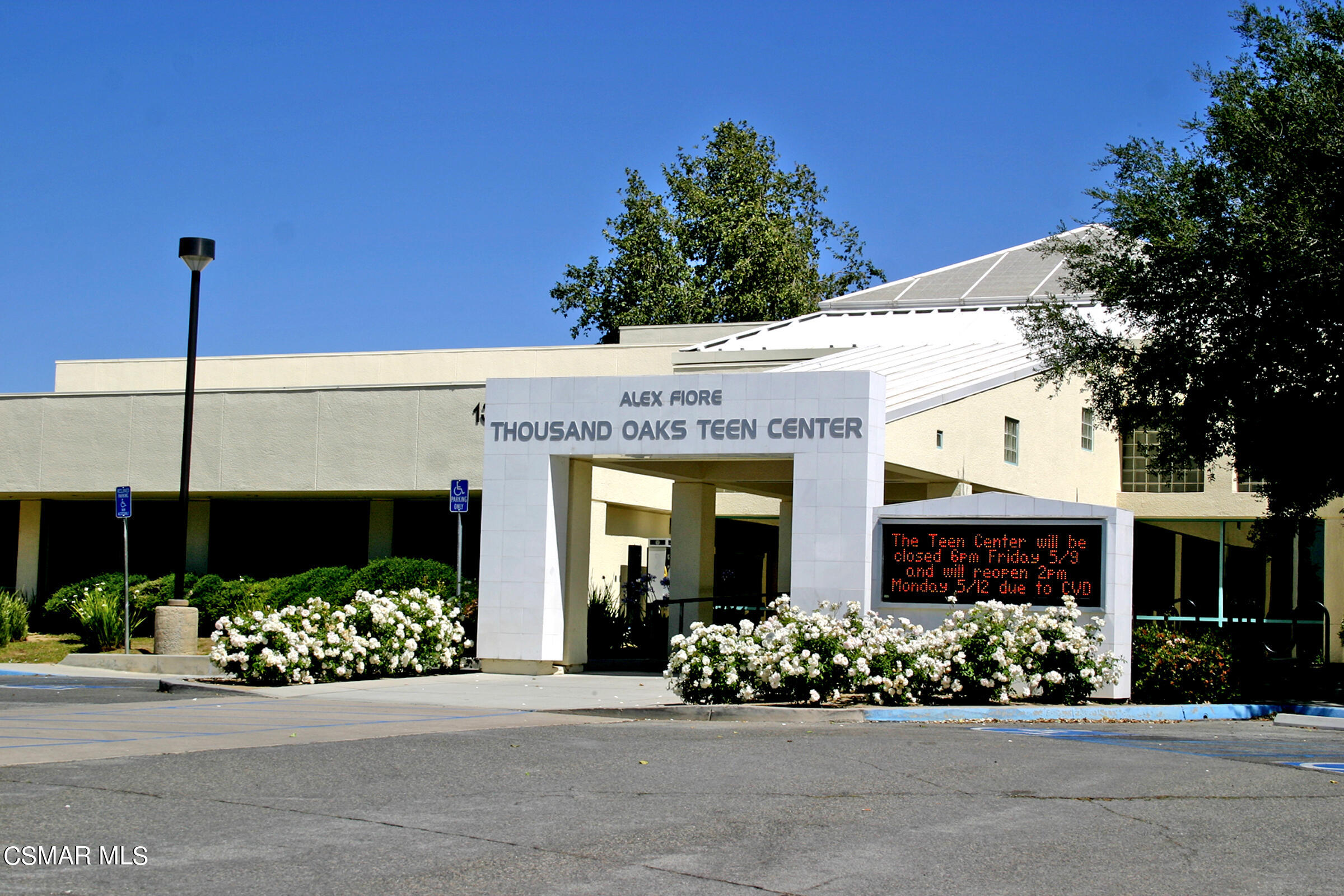 3092 Big Sky Drive Thousand Oaks, CA 91360 - Photo 49 of 66 a front view of a building with flowers
