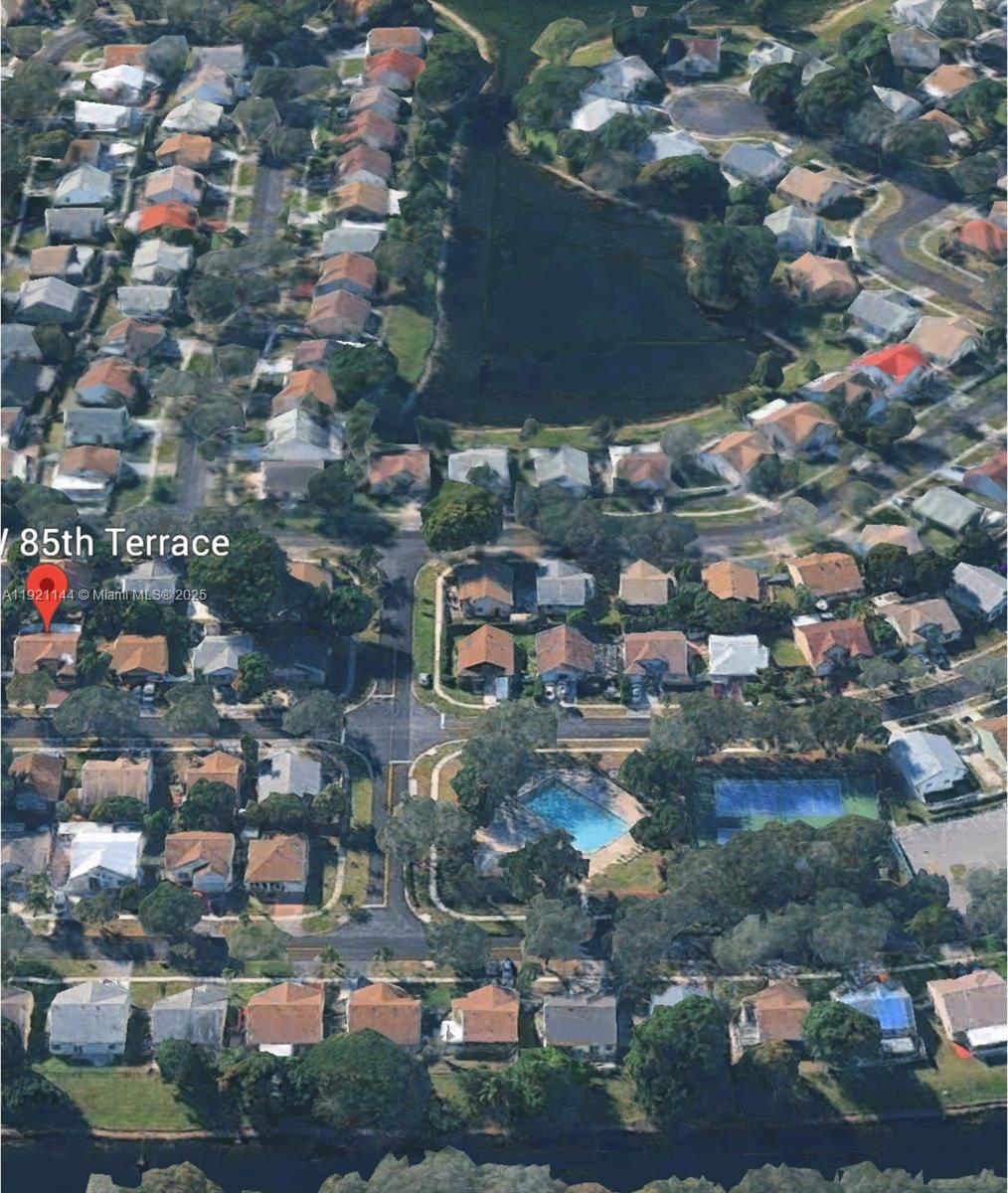 1430 Southwest 85th Terrace Pembroke Pines, FL 33025 - Photo 7 of 27 an aerial view of residential houses with outdoor space
