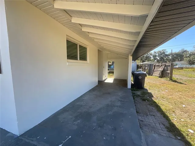 a view of a backyard of the house