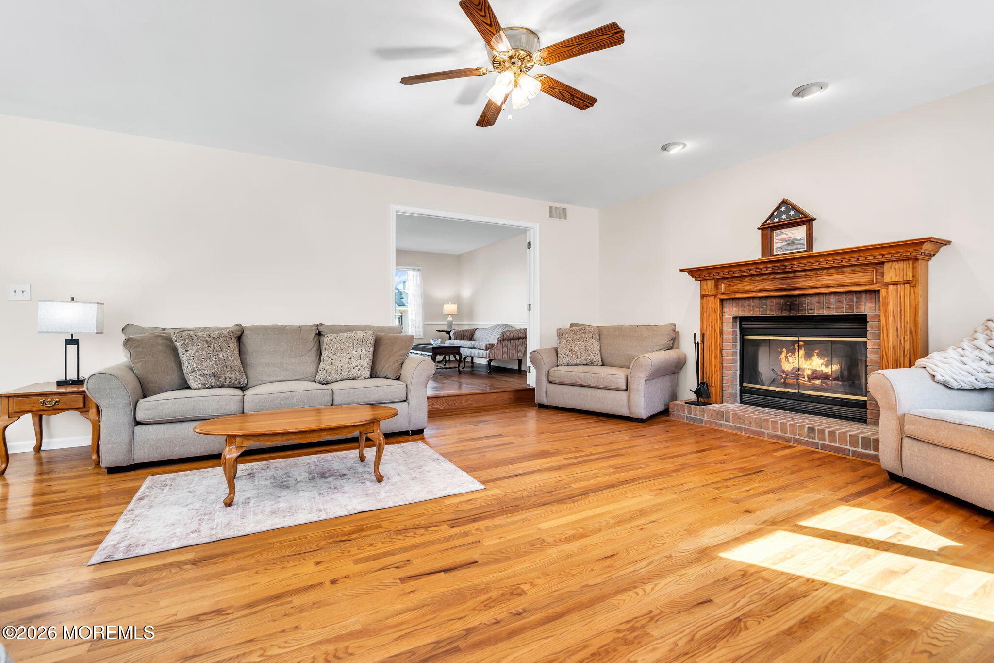 250 Bent Hook Road Toms River, NJ 08755 - Photo 13 of 63 a living room with furniture and a fireplace