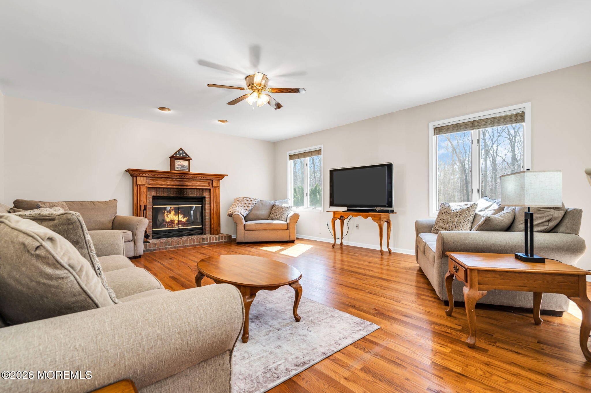 250 Bent Hook Road Toms River, NJ 08755 - Photo 14 of 63 a living room with furniture a fireplace and a flat screen tv
