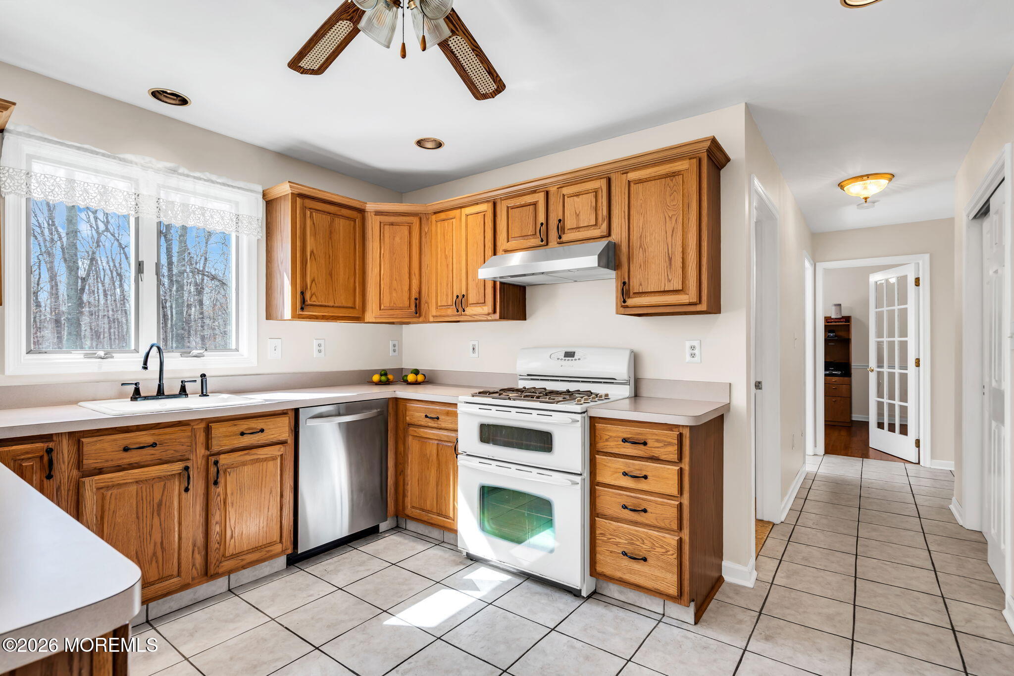 250 Bent Hook Road Toms River, NJ 08755 - Photo 20 of 63 a kitchen with stainless steel appliances granite countertop a stove and a sink