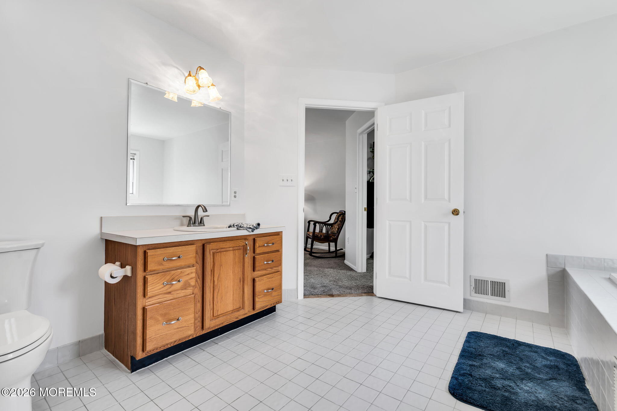 250 Bent Hook Road Toms River, NJ 08755 - Photo 36 of 63 a spacious bathroom with a double vanity sink a toilet and a mirror