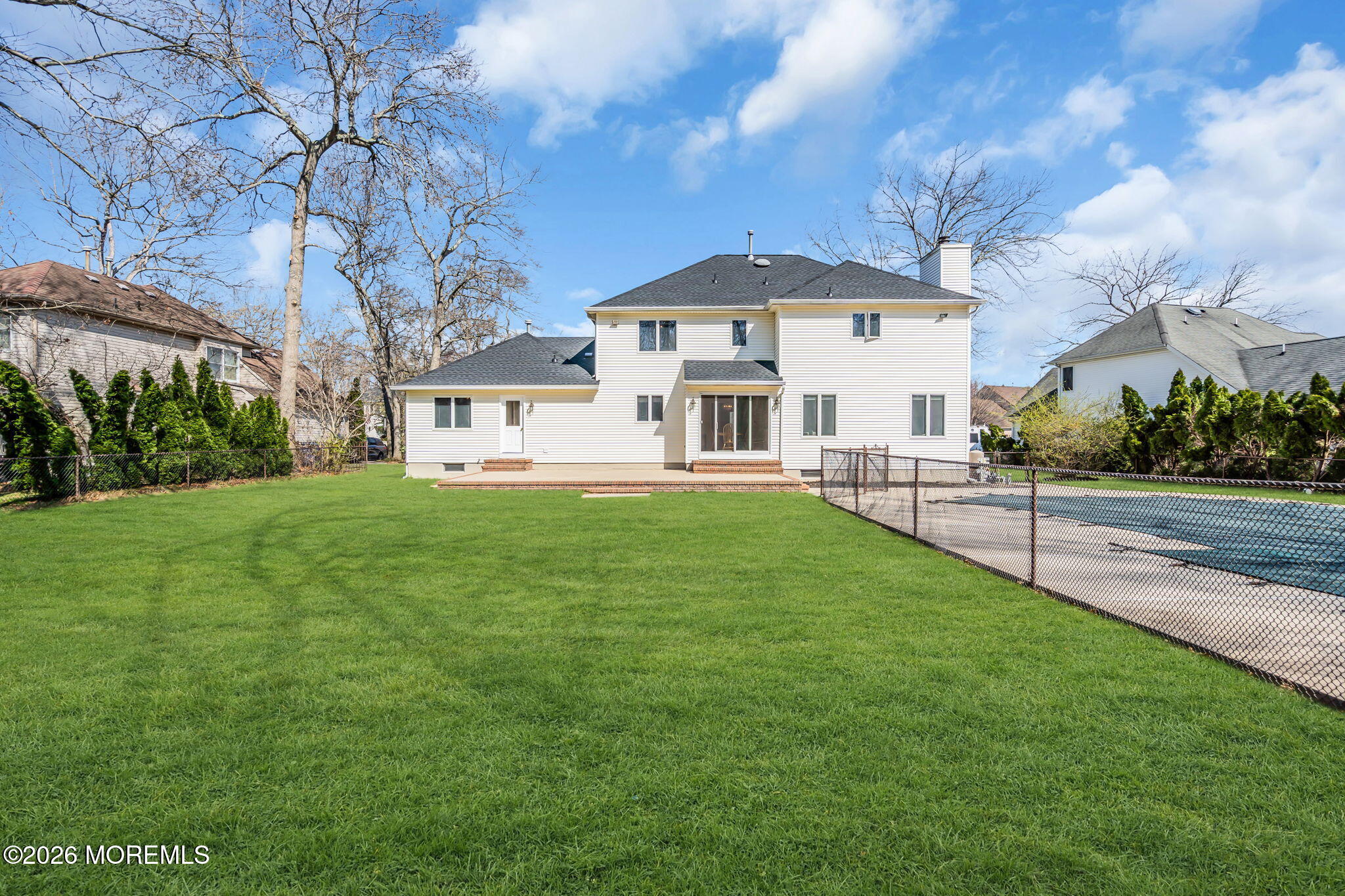 250 Bent Hook Road Toms River, NJ 08755 - Photo 49 of 63 a front view of a house with a yard table and chairs