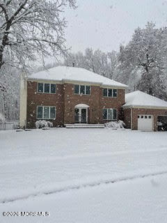 250 Bent Hook Road Toms River, NJ 08755 - Photo 62 of 63 a front view of a house with a yard and garage