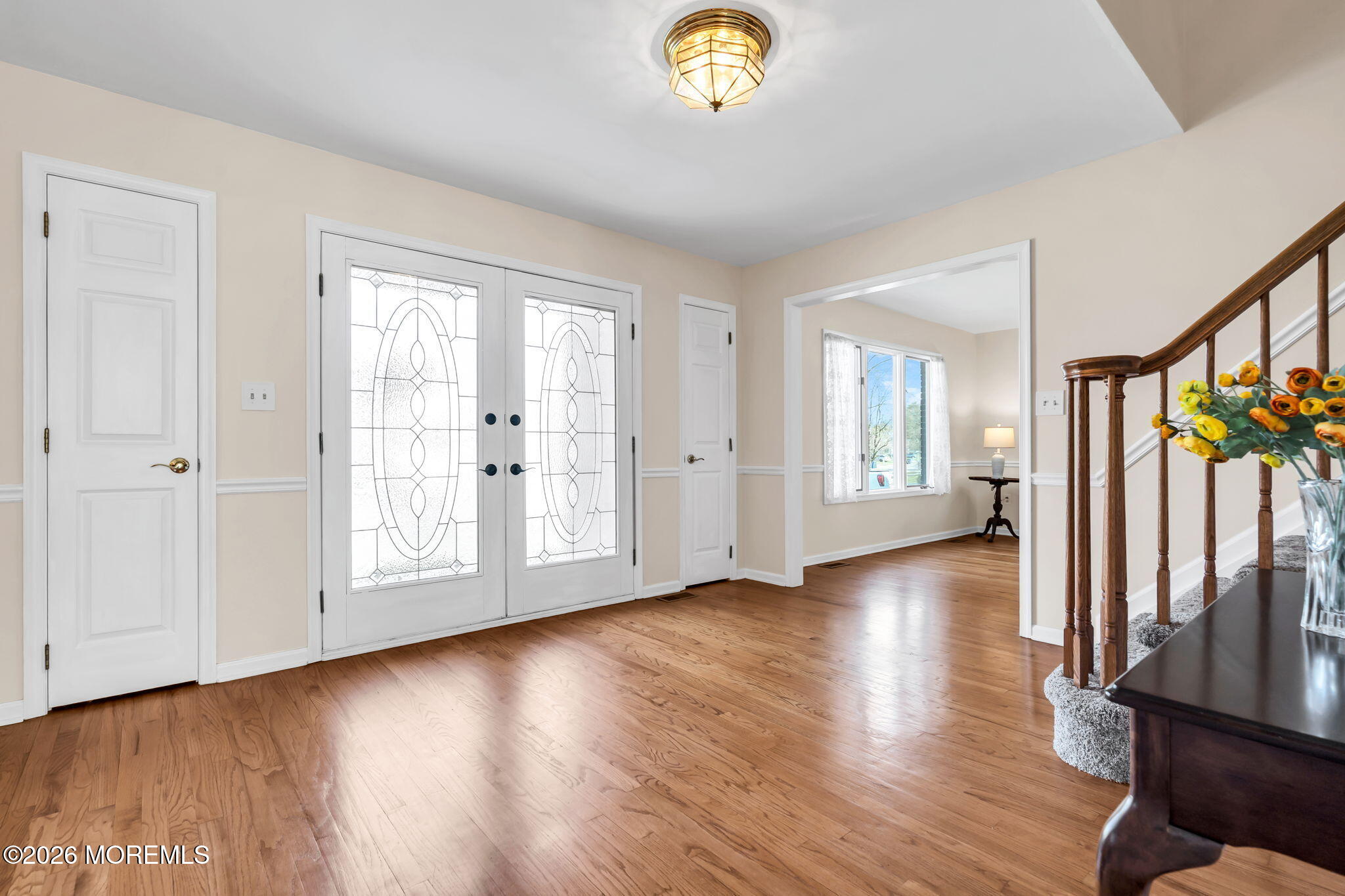 250 Bent Hook Road Toms River, NJ 08755 - Photo 8 of 63 an empty room with wooden floor and windows