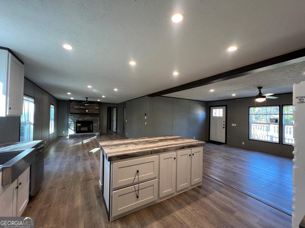 156-j F Hall Road Gordon, GA 31031 - Photo 12 of 13 a view of an empty room with window and wooden floor