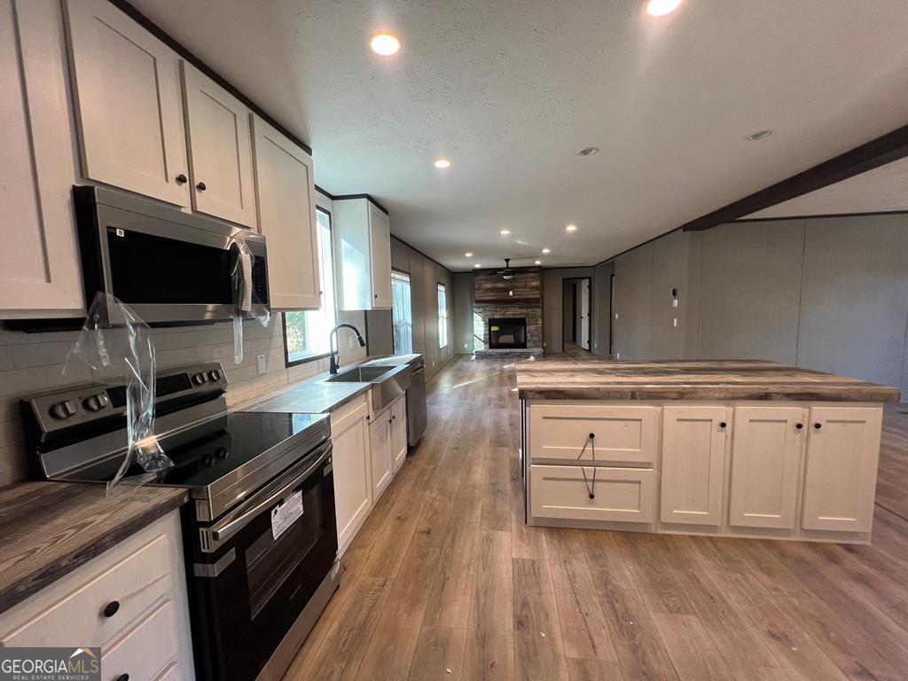 156-j F Hall Road Gordon, GA 31031 - Photo 4 of 13 a large kitchen with cabinets