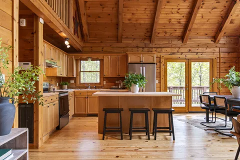 a bedroom with a bed and a shower