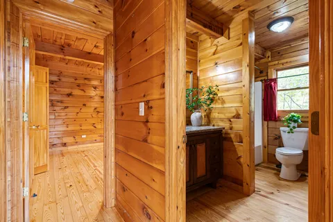 a view of balcony with wooden floor