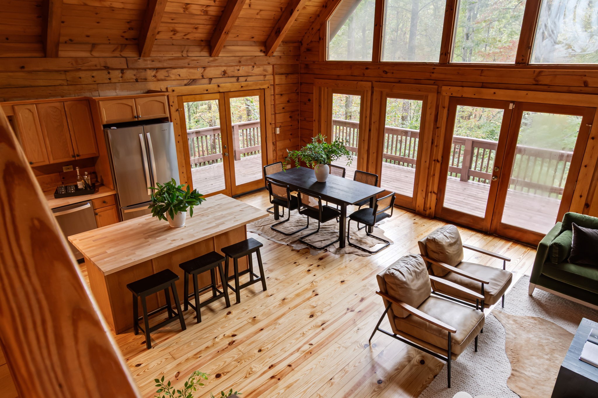 5740 North Lick Creek Road Franklin, TN 37064 - Photo 58 of 100 a living room with furniture a fireplace and potted plants