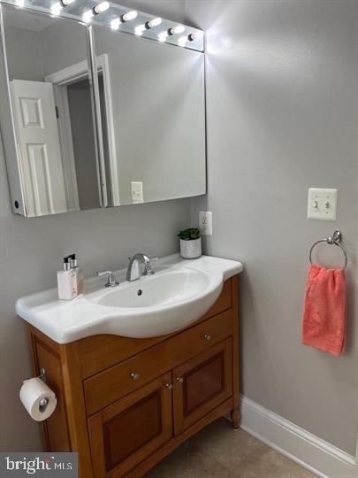 1610 4th Street Northwest Washington, DC 20001 - Photo 11 of 21 a bathroom with a sink and a mirror