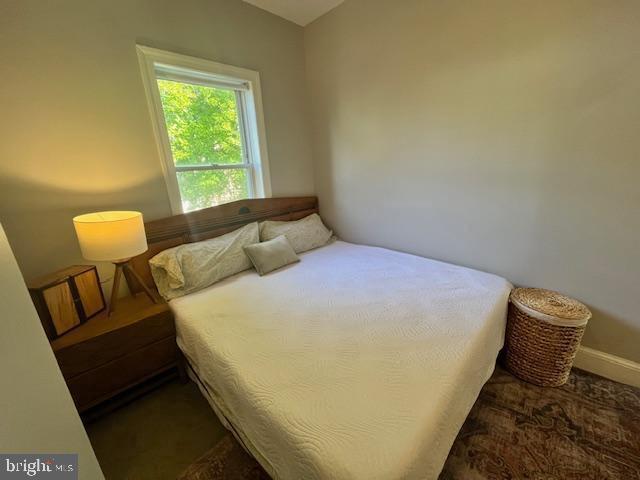 1610 4th Street Northwest Washington, DC 20001 - Photo 13 of 21 a bed sitting in a bedroom next to a window