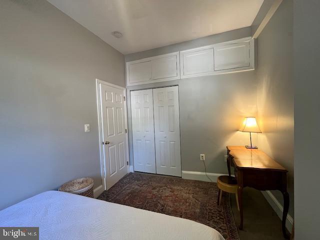 1610 4th Street Northwest Washington, DC 20001 - Photo 15 of 21 a bedroom with a bed and a table in it