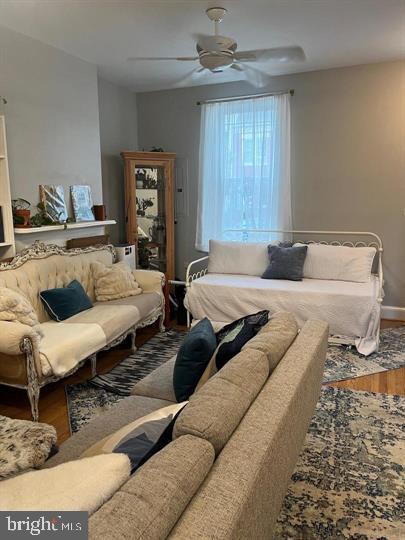 1610 4th Street Northwest Washington, DC 20001 - Photo 7 of 21 a living room with furniture and a fireplace