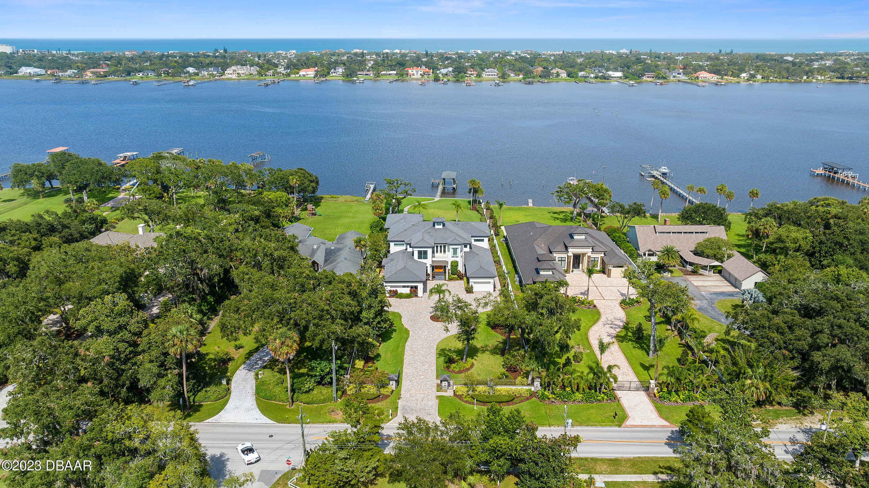 437 North Beach Street Ormond Beach, FL 32174 - Photo 158 of 162 an aerial view of a house with a lake view