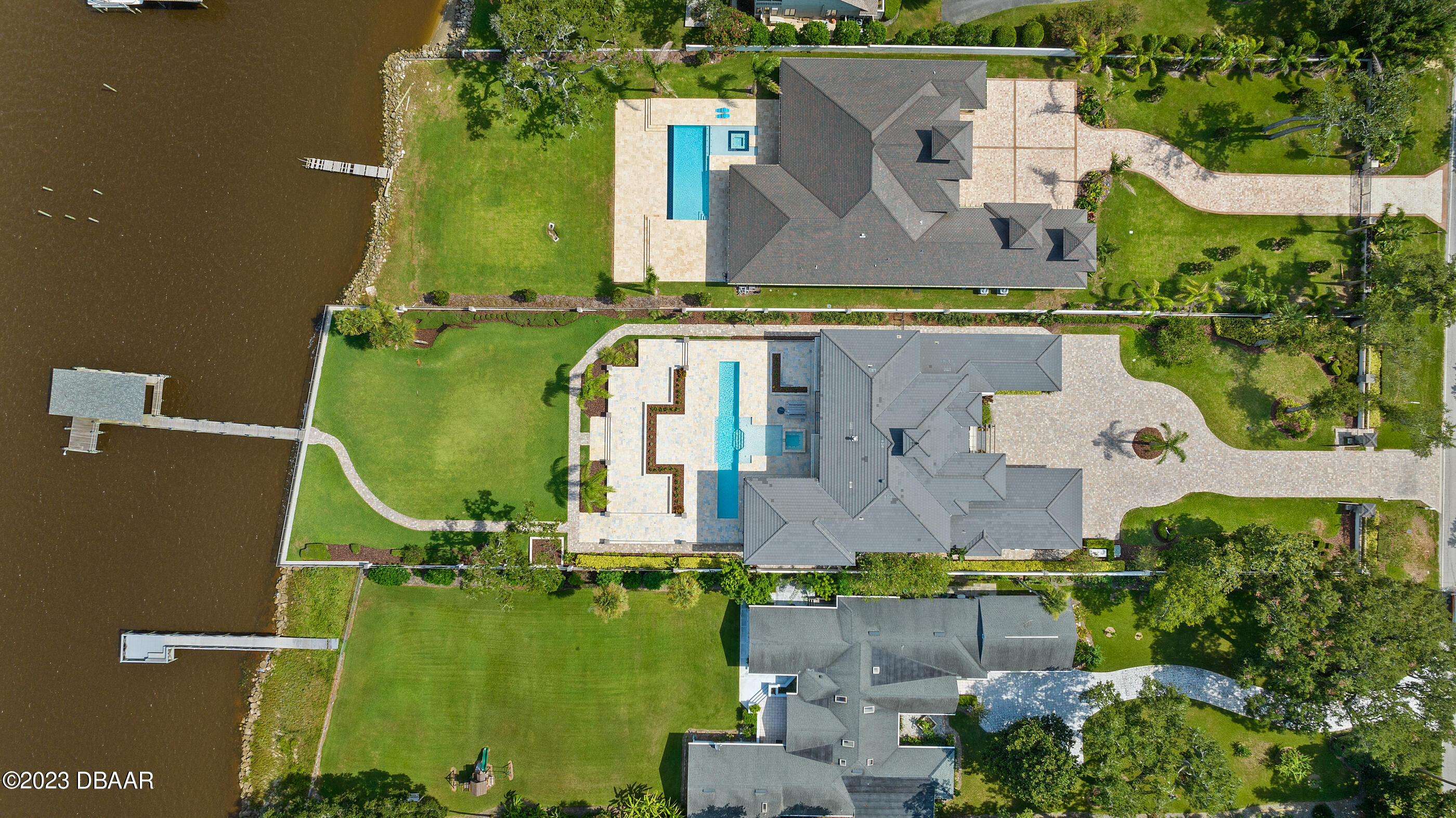 437 North Beach Street Ormond Beach, FL 32174 - Photo 159 of 162 an aerial view of a house with a garden