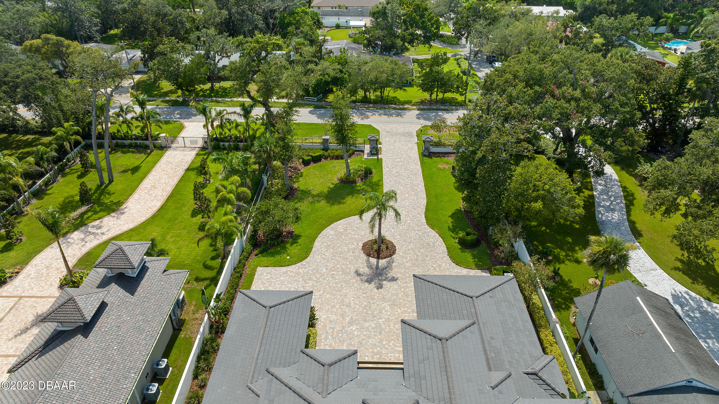 437 North Beach Street Ormond Beach, FL 32174 - Photo 161 of 162 an aerial view of residential house with outdoor space and swimming pool