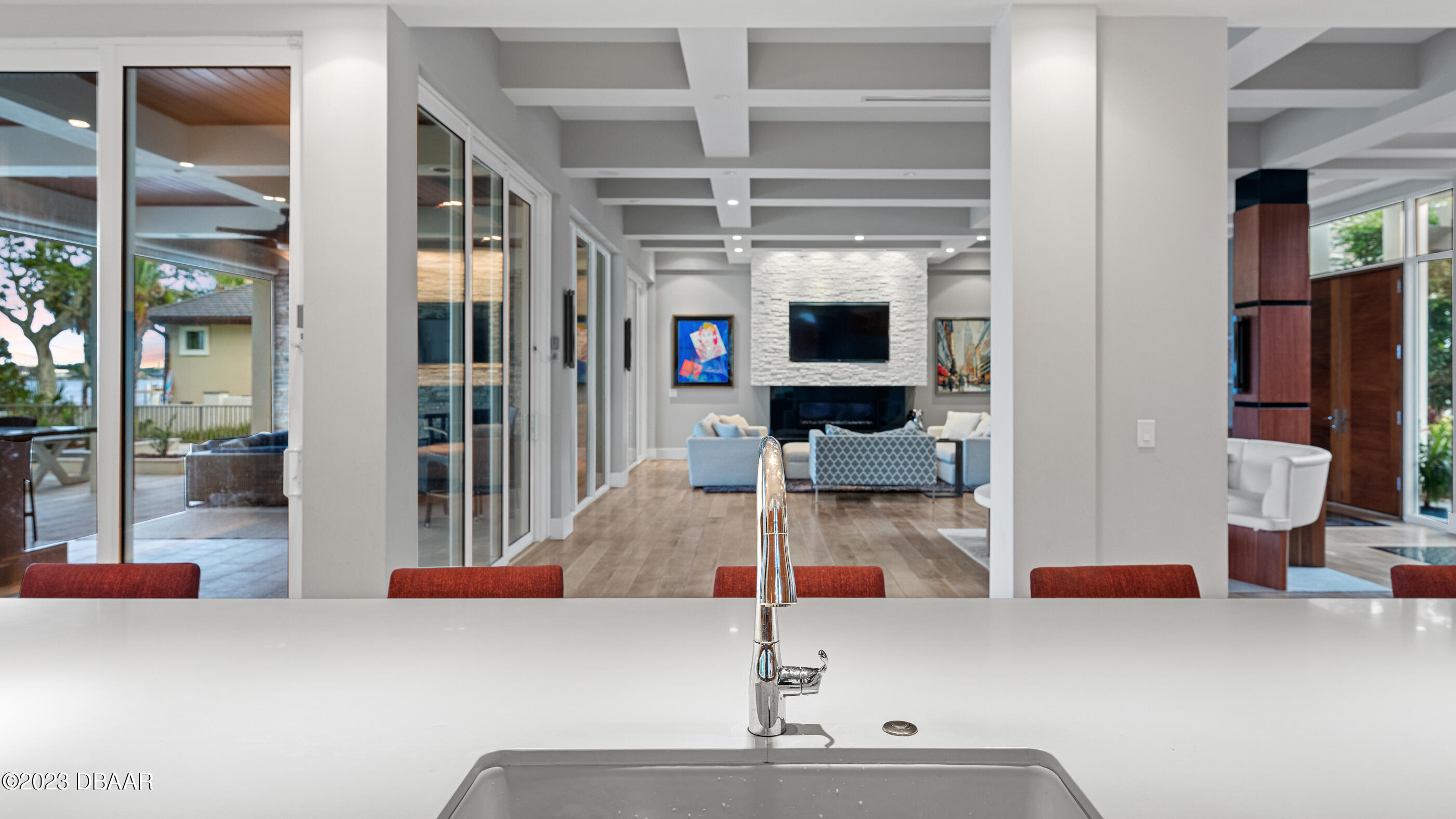 437 North Beach Street Ormond Beach, FL 32174 - Photo 29 of 162 a living room with furniture and a flat screen tv