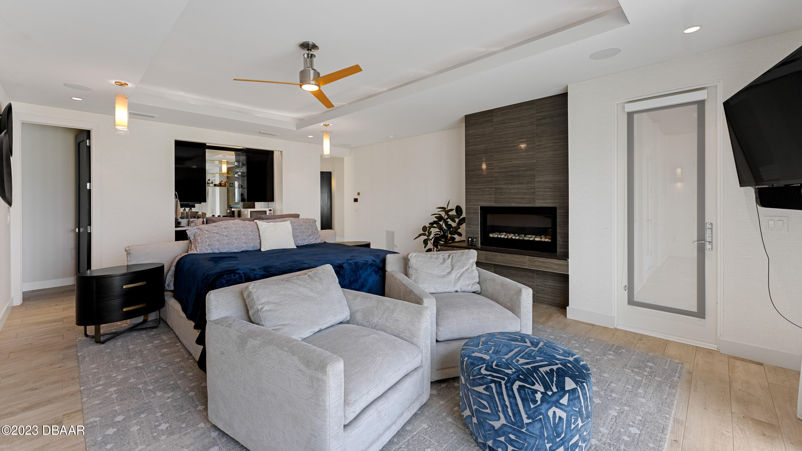 437 North Beach Street Ormond Beach, FL 32174 - Photo 42 of 162 a living room with furniture and a flat screen tv