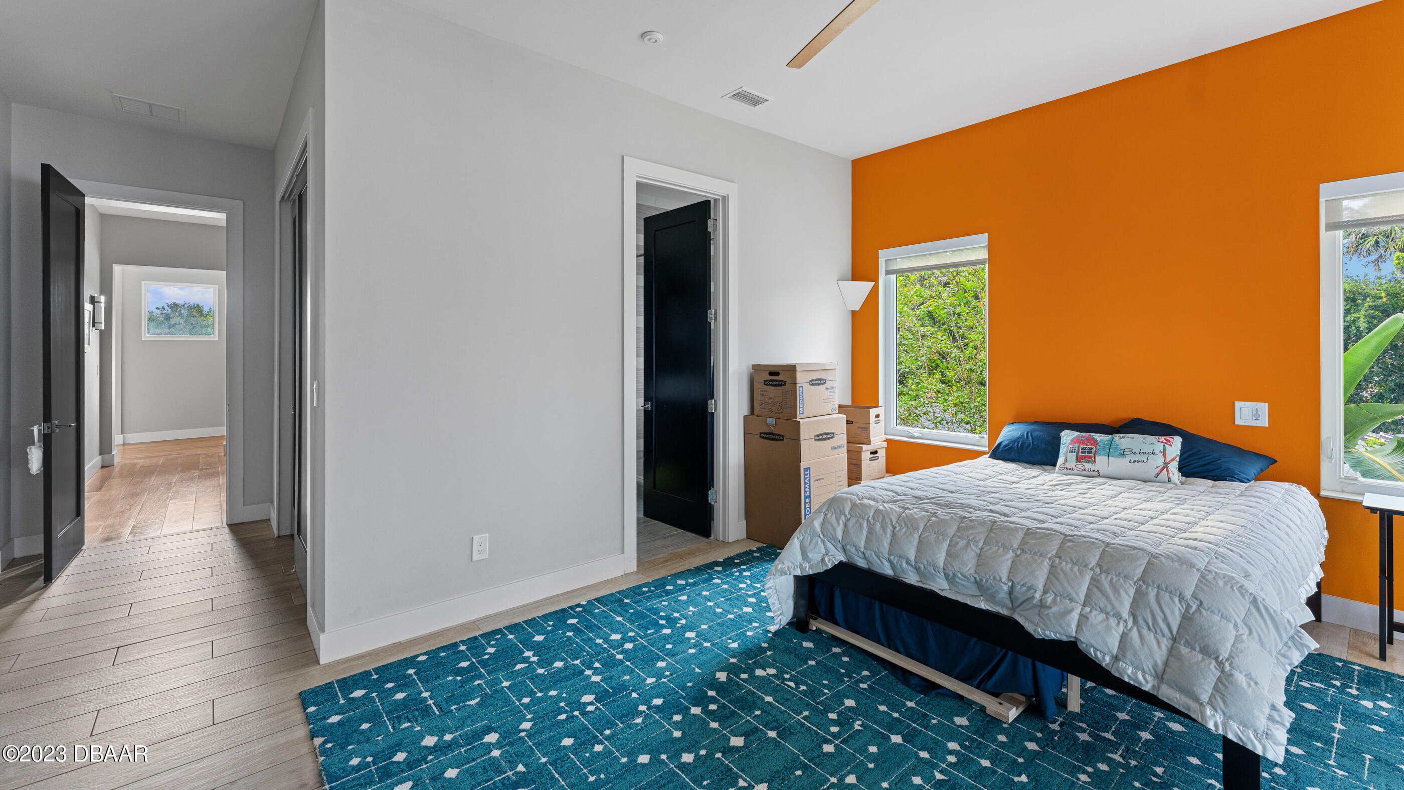 437 North Beach Street Ormond Beach, FL 32174 - Photo 60 of 162 a bedroom with a bed and wooden floor