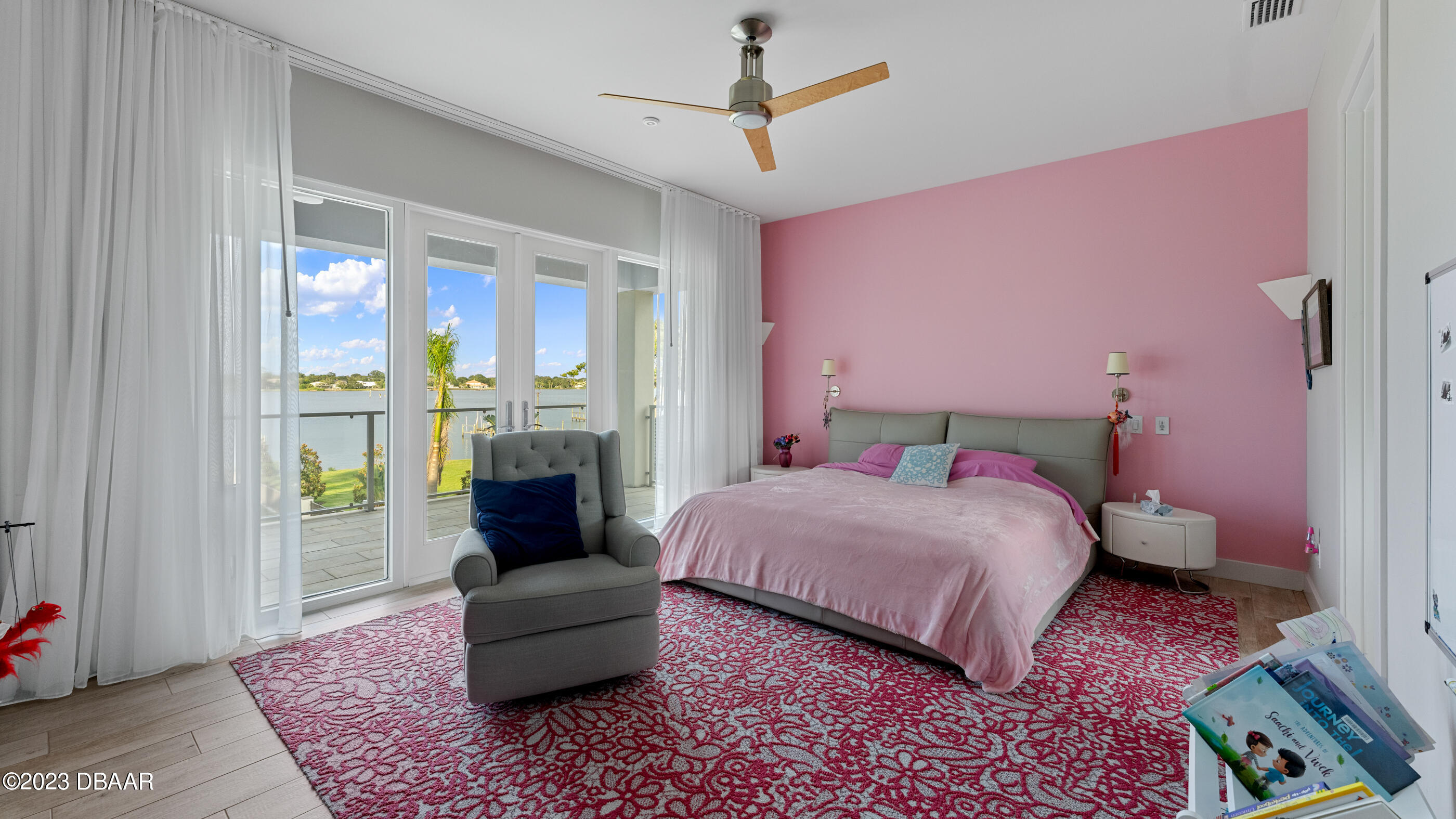 437 North Beach Street Ormond Beach, FL 32174 - Photo 65 of 162 a bedroom with a bed couch and a window