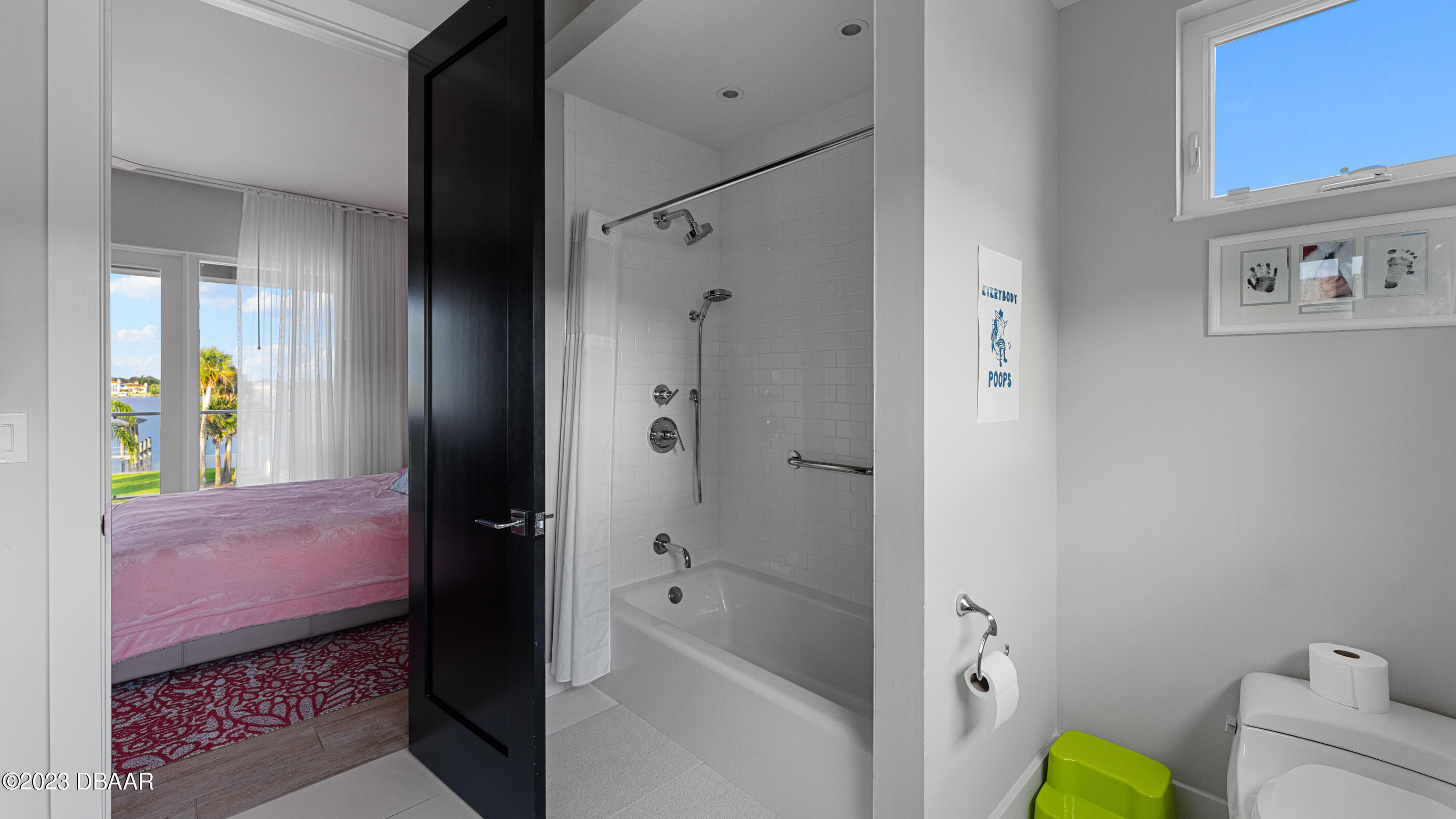 437 North Beach Street Ormond Beach, FL 32174 - Photo 67 of 162 a bathroom with a bathtub and a shower