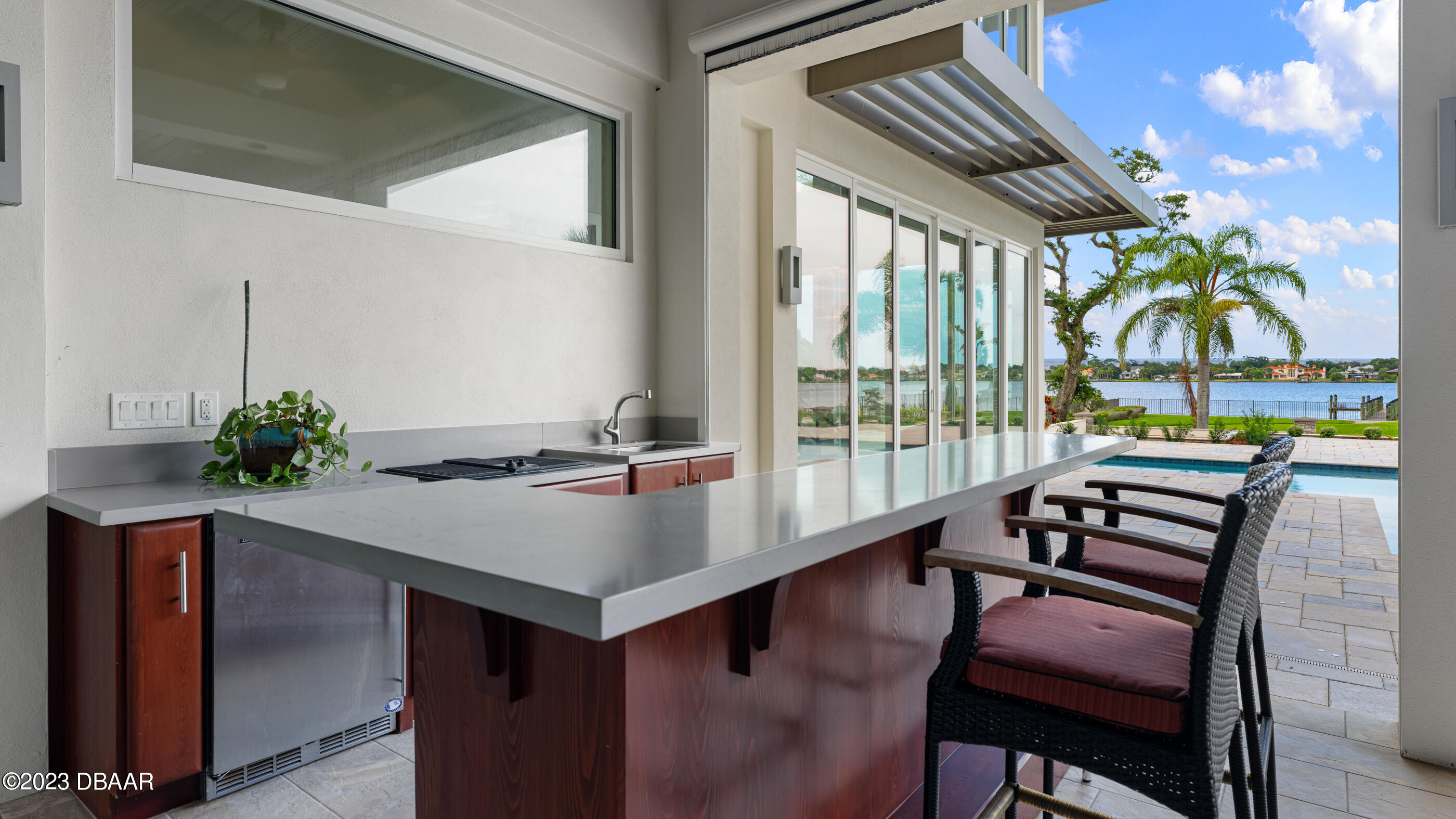 437 North Beach Street Ormond Beach, FL 32174 - Photo 86 of 162 a view of a dining room with furniture window and outside view