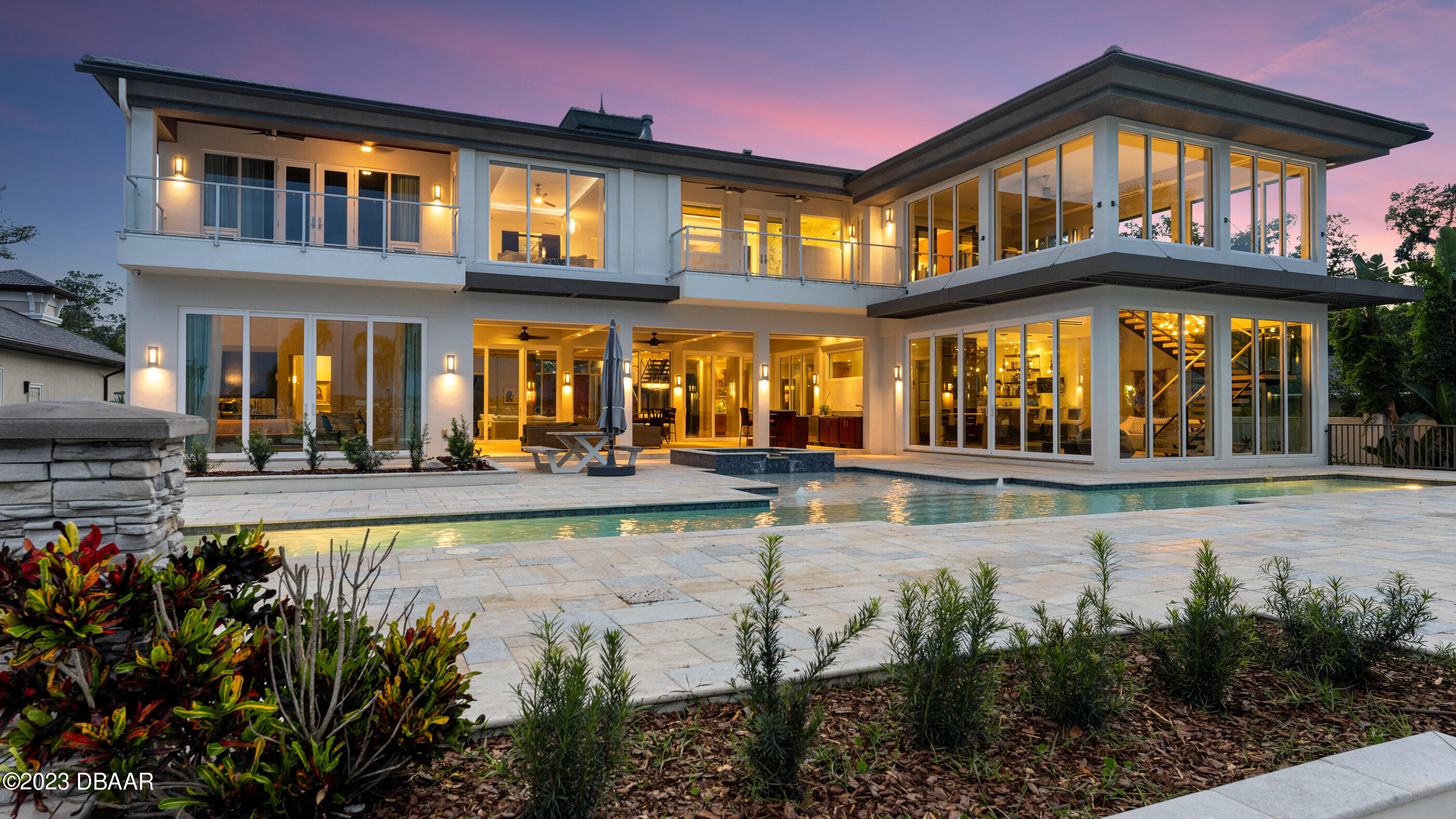 437 North Beach Street Ormond Beach, FL 32174 - Photo 91 of 162 a view of a building with a swimming pool