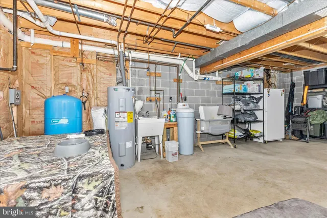 a view of yard with swimming pool and trees