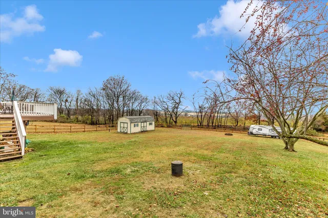 front view of a brick house with a large windows