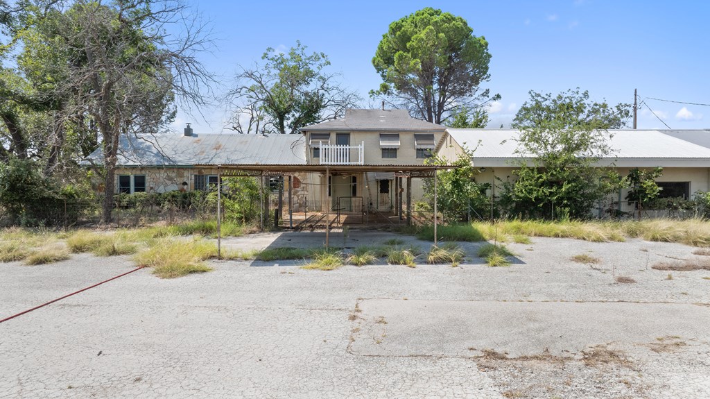 131 Elberta Street Stonewall, TX 78671 - Photo 24 of 71 a view of house with a yard and sitting area