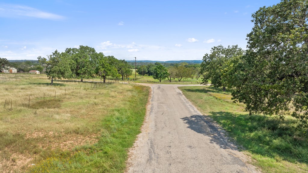 131 Elberta Street Stonewall, TX 78671 - Photo 41 of 71 a view of an outdoor space and a yard