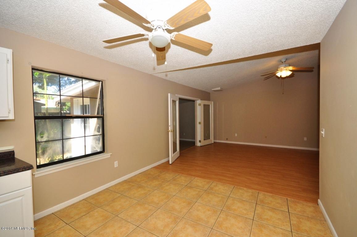450 Orchis Road St. Augustine, FL 32086 - Photo 7 of 18 a view of an empty room with a window