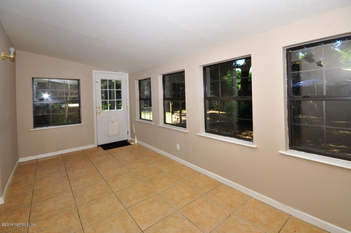 450 Orchis Road St. Augustine, FL 32086 - Photo 10 of 18 a view of an empty room with a window