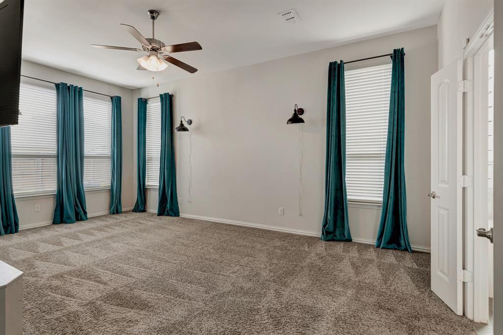 3061 Bella Lago Drive Fort Worth, TX 76177 - Photo 14 of 27 a view of a room with a large mirror