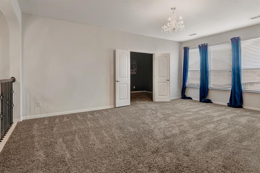 3061 Bella Lago Drive Fort Worth, TX 76177 - Photo 20 of 27 a view of an empty room with a window
