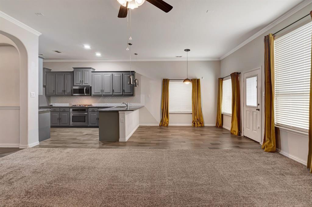 3061 Bella Lago Drive Fort Worth, TX 76177 - Photo 8 of 27 a view of kitchen with refrigerator and window