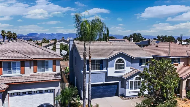 a house view with a garden space